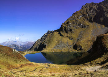Scenic view of mountains against clear sky