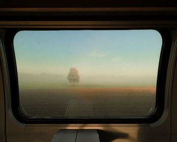 Scenic view seen through train window