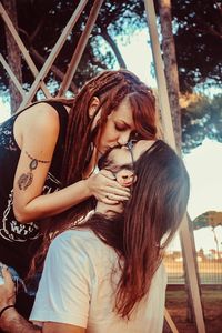 Beautiful young woman looking down