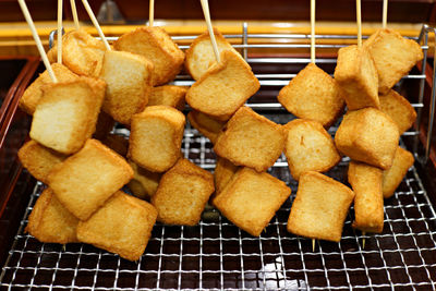 Close-up of fried food on cooling rack