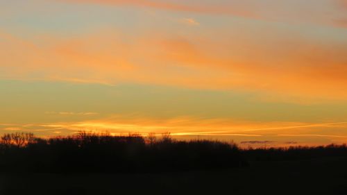 Scenic view of dramatic sky during sunset