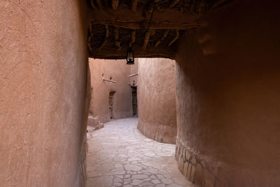 A covered narrow street in ushayqir heritage village, saudi arabia