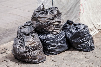 Garbage bags on sidewalk