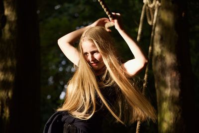 Portrait of smiling young woman