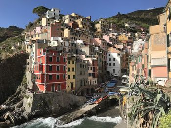 Buildings in city against sky