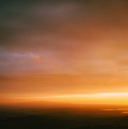 Scenic view of dramatic sky during sunset