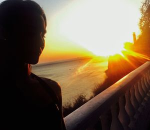 Portrait of man looking at sunset