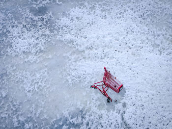 High angle view of red boat in water