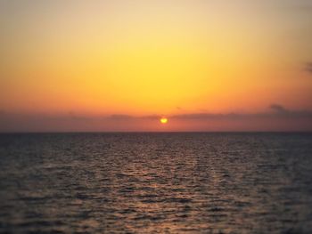 Scenic view of sunset over sea