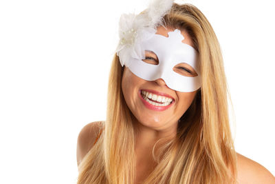 Portrait of a smiling young woman over white background