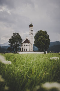 Church on field against sky