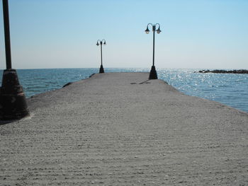 Scenic view of beach against clear sky