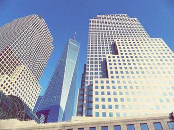 Low angle view of modern building against clear sky