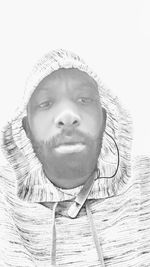 Close-up portrait of smiling young woman