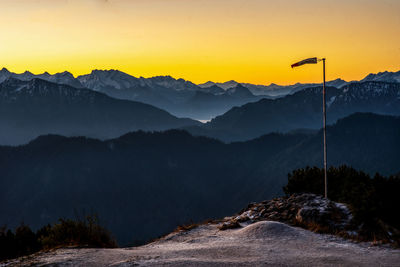 Scenic view of mountains against sky during sunset