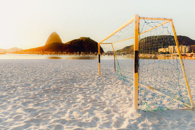 Scenic view of beach against clear sky