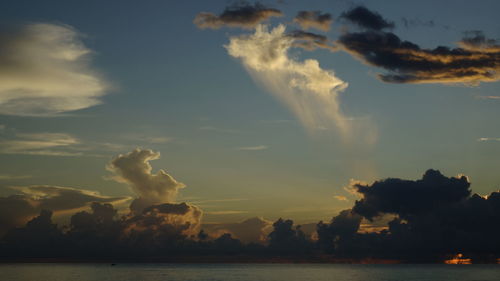 Scenic view of sea against dramatic sky