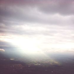 Sun shining through clouds