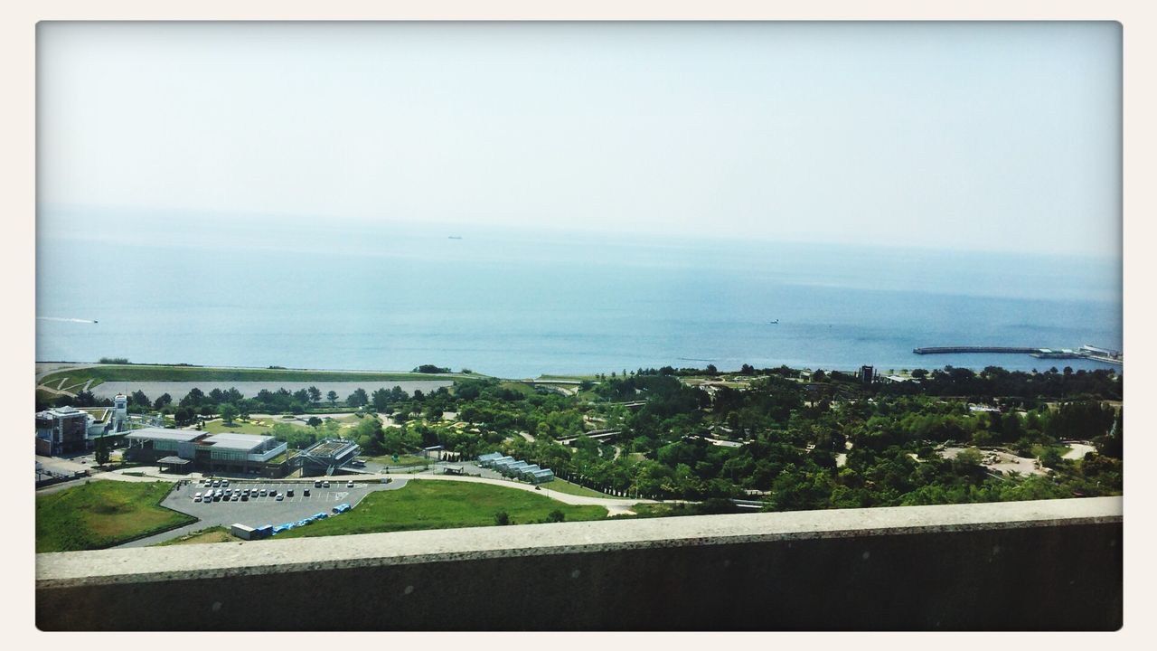 sea, transfer print, horizon over water, water, auto post production filter, built structure, architecture, building exterior, clear sky, high angle view, copy space, sky, scenics, nature, beach, coastline, tranquil scene, day, tranquility, outdoors