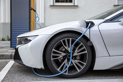 Electric car gettig charged at an charging station