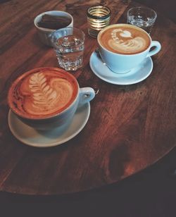 High angle view of coffee cup on table