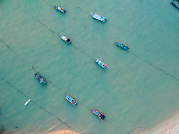 High angle view of fishing boats in sea 