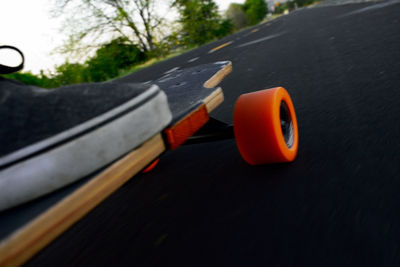 Close-up of car on road