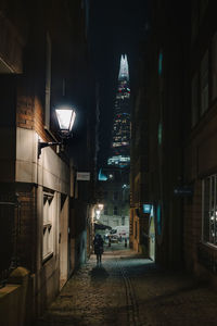 Illuminated street at night