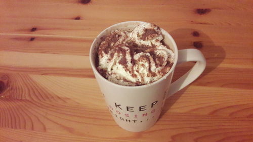 Close-up of cappuccino on table