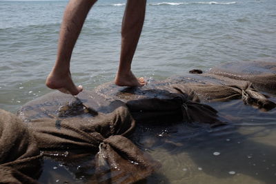 Low section of man in water