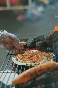 Close-up of person preparing food