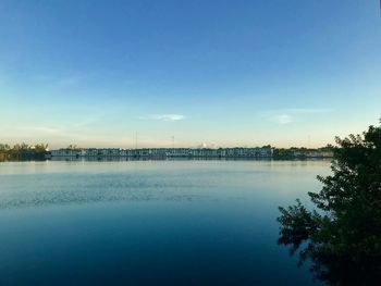 Scenic view of lake against blue sky