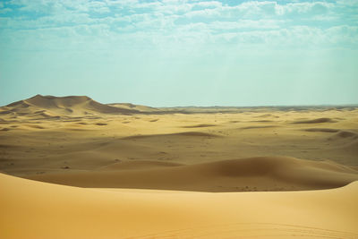 Scenic view of desert against sky