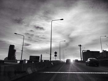 View of road against cloudy sky