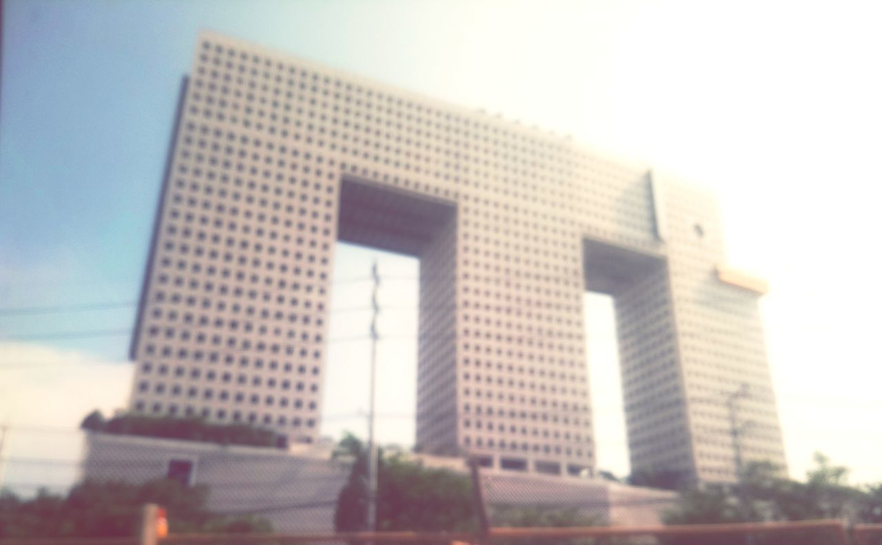 LOW ANGLE VIEW OF BUILDINGS AGAINST SKY