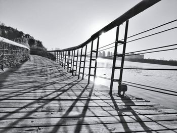 Pier on sea against sky