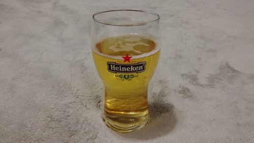 Close-up of beer glass on table