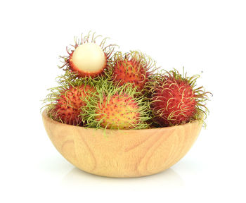 Close-up of fruits against white background