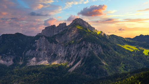 Scenic view of mountains against sky during sunset