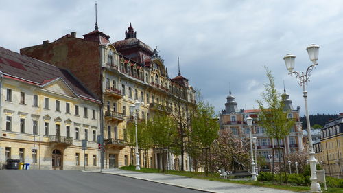 Buildings in city against sky