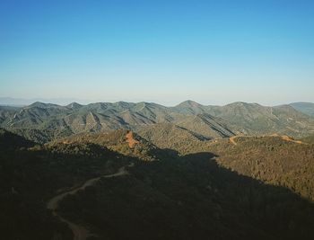 Scenic view of mountains against clear sky