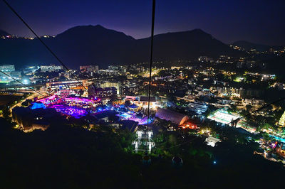 High angle view of illuminated city at night