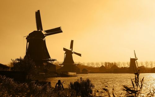 Traditional windmill at sunset