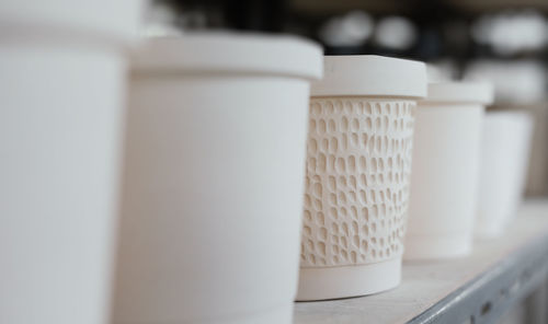 Close-up of coffee cup on table