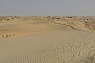 Scenic view of desert against sky