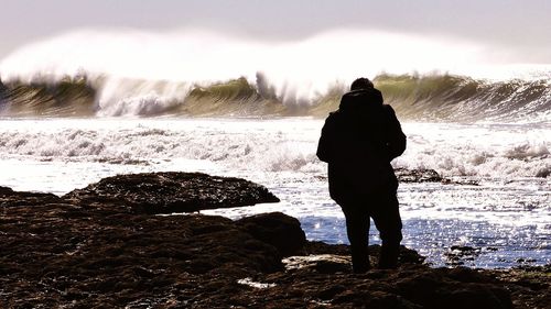 Man standing on rock