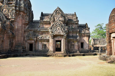 Old temple building against clear sky