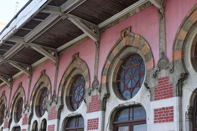 Low angle view of stained glass window of building