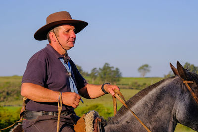 Man with a horse