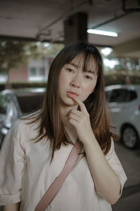 Portrait of teenage girl in car